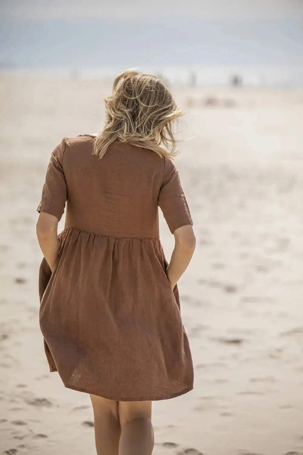 Linen Dress with Pockets, back view, walking on the beach