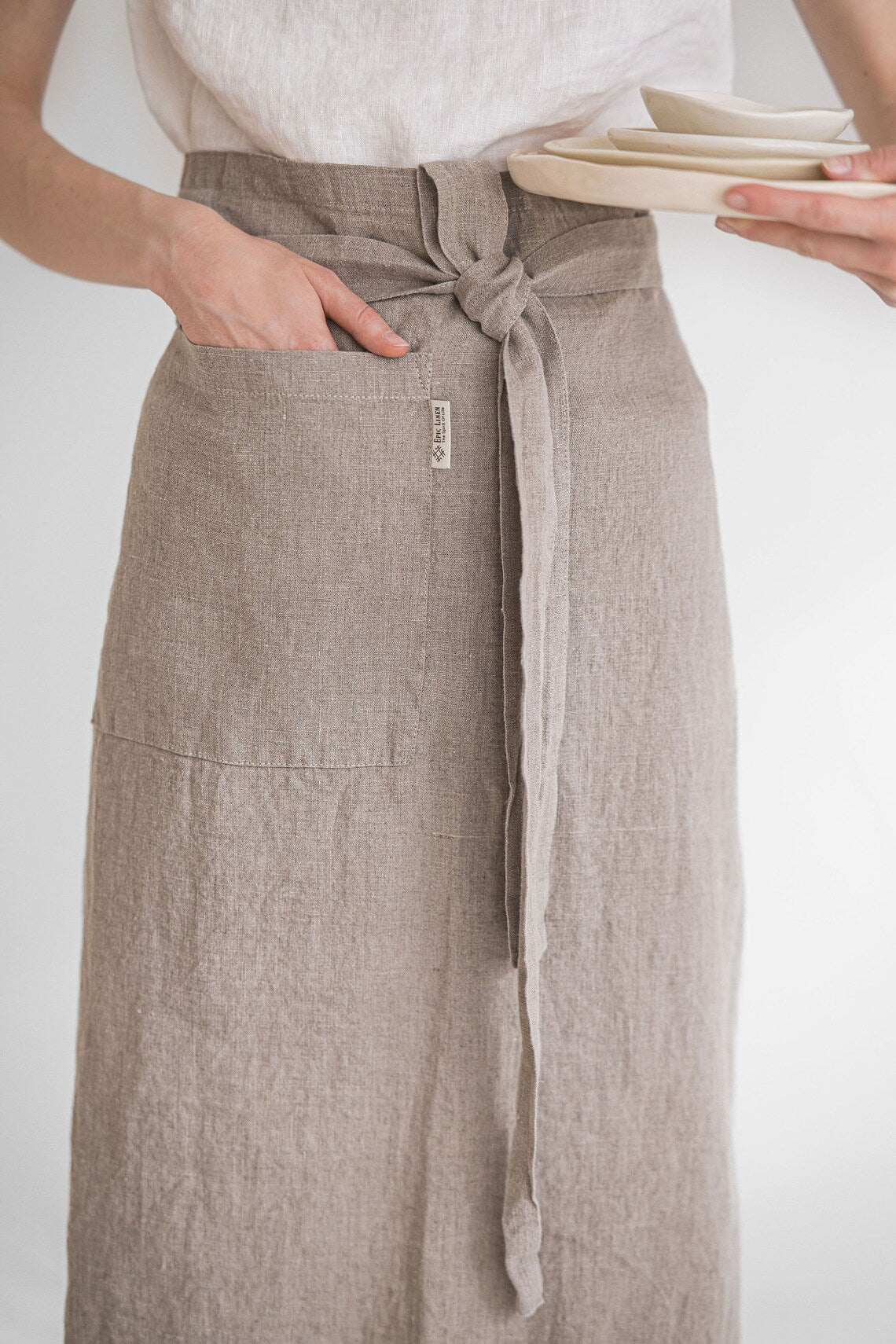 Explore our premium collection of linen attire for the service industry from a leading textile factory, featuring high-quality wholesale linen uniforms, durable linen workwear, stylish linen aprons, and comfortable linen shirts for hospitality. Ideal for restaurants, hotels, and catering businesses, our European-made linen apparel ensures both elegance and functionality.