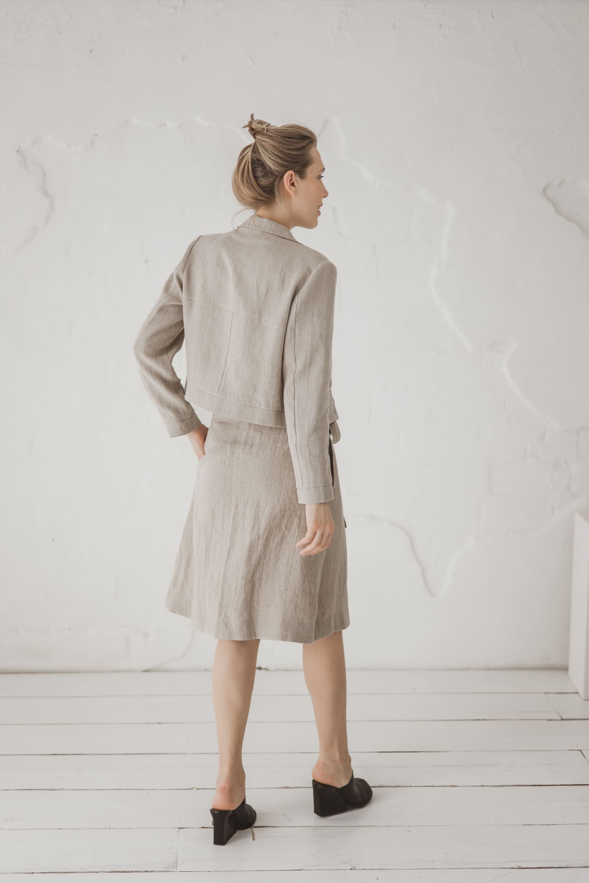 Structured Cropped Linen Blazer — back view with linen skirt and heels